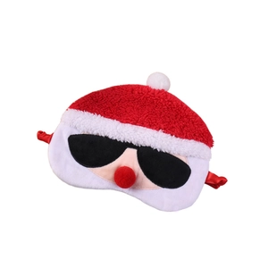Detail of plush reindeer sleep mask with cartoon Santa sunglasses design for Christmas