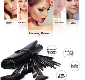 Detail of 24pcs makeup brush set with fiber hair and black leather roll-up pouch organizer