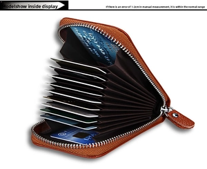 Macro view of brown lychee grain leather wallet showing 11 accordion card slots