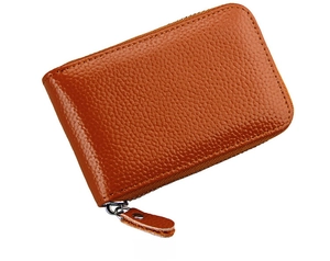Side view of brown lychee grain leather wallet with smooth metal zipper and leather puller