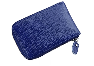 Side view of dark blue litchi grain leather card holder with silver zipper closure