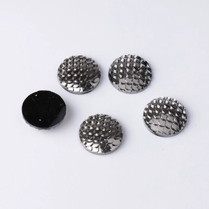 Detail view of 14mm gunmetal fish scale resin beads showing front texture and flat back