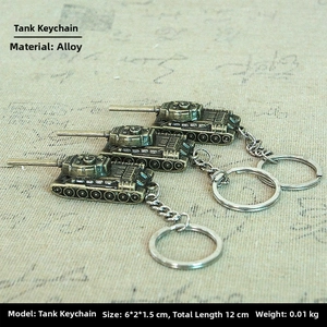 Detailed retro bronze tank keychain made of alloy with intricate treads on vintage fabric