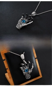 Detailed dragon claw pendant with blue eye inlay on vintage stainless steel chain