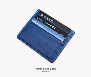 Detail showing the royal blue lychee leather card holder back with precise stitching