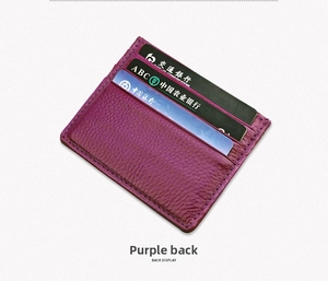 Macro view of purple litchi grain leather card holder with three card slots display