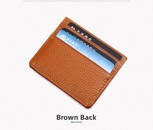 Detailed back view of brown litchi pattern leather card holder with three card slots