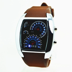 Detailed macro of silver LED aviation watch face with racing dashboard digital display