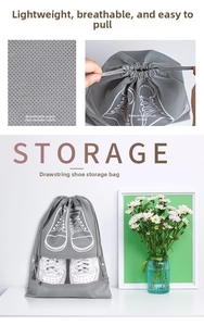 Detail of grey non-woven shoe storage bag with drawstring and clear plastic window