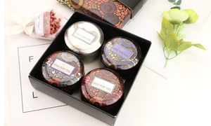 Four-piece set of Chiyogami tinplate aromatherapy candles in a black gift box packaging