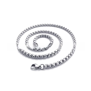 Macro detail of stainless steel box chain necklace with a secure lobster clasp closure