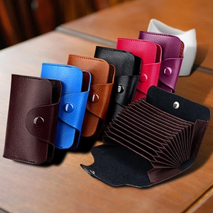 Detail of accordion style RFID credit card holders in various colors with leather texture