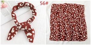 Detail of red-brown leopard print silk scarf showing tied bow and flat layout views