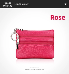 Close-up of rose genuine leather coin purse with triple zipper design and silver keychain