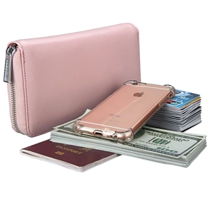 Pink leather RFID passport wallet showing interior slots for cards, cash, and smartphone