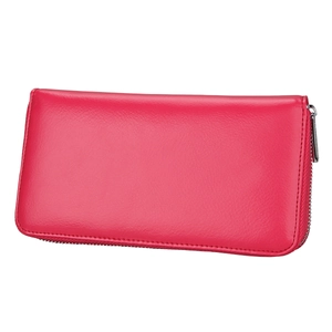 Detail of deep pink leather long wallet showing smooth texture and silver metal zipper