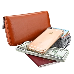 Macro view of brown lychee leather wallet showing large capacity for phone and cash