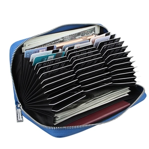 Detail view of royal blue accordion wallet with multi-card slots and RFID protection