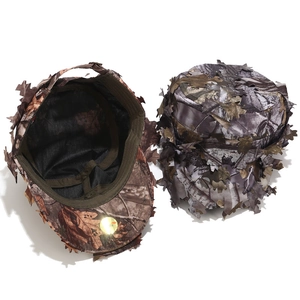 Detail of 3D leaf camouflage hunting hat featuring breathable mesh lining and adjustable strap