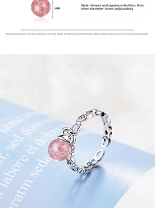Detail of adjustable heart ring with 6mm pink strawberry crystal and zircon accents