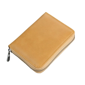 Detail of caramel leather RFID wallet featuring smooth silver zipper and rounded edges