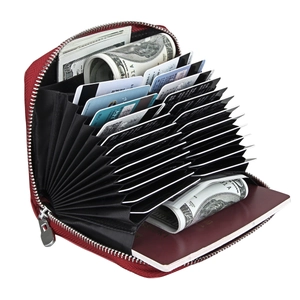 Macro view of red lychee grain leather RFID wallet with multi-slot accordion card holder