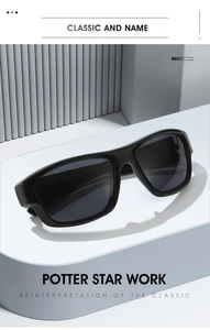 Detail view of bold Y2K rectangular sunglasses featuring wide temples and grey lenses