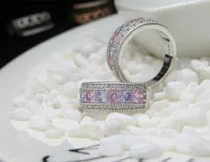 Detailed macro view of S925 silver ring with pink cubic zirconia and micro-set crystals