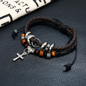 Punk style men's braided leather bracelet with silver cross pendant and wood beads