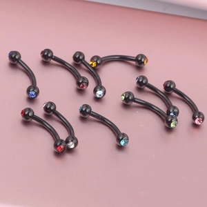 Black curved barbell piercing rings with vibrant multi-colored crystal stud accents