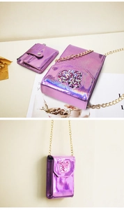 Detail view of purple holographic crossbody bag with heart sequins and golden chain