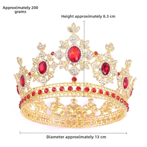 Detailed view of gold bridal crown with red gemstones and white crystals, 13cm diameter