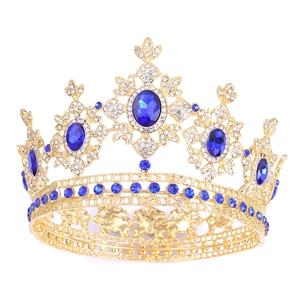 Golden baroque bridal crown with deep blue crystals and rhinestones for weddings