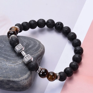 Lava rock and tiger eye beaded fitness bracelet with silver barbell charm and engraving