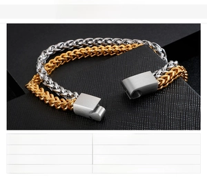 Macro shot of 30g stainless steel wheat link bracelet showing matte metal buckle detail