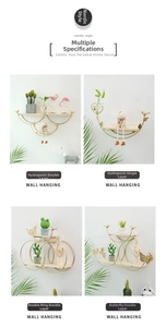 Modern gold metal wall shelves in Nordic style with wooden base and bird decor accents