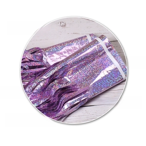 Detail of purple laser tinsel curtain with 6mm adhesive tape on PET material surface