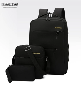 Three-piece black waterproof oxford backpack set with yellow text and USB charging port