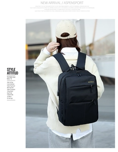 Detail of waterproof business backpack with USB port and yellow Backpack print