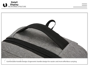 Close-up of durable grey oxford fabric and heavy-duty nylon handle on business backpack
