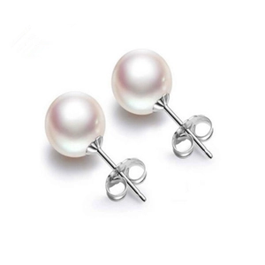 Close-up of elegant 925 silver pearl stud earrings with smooth white finish and metal posts