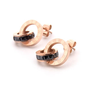 Boucles d'oreilles double anneau or rose avec chiffres romains et cristaux noirs élégants