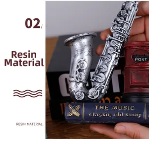 Detailed view of retro resin saxophone and postbox pen holder with vintage texture