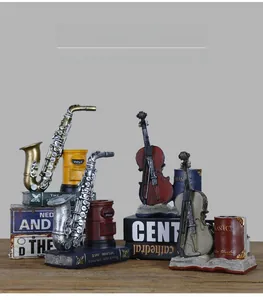 Detailed close-up of retro musical instrument pen holder with saxophone and violin motifs
