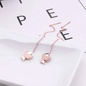 Minimalist rose gold fish-shaped earrings in titanium steel with zircon and frosted finish