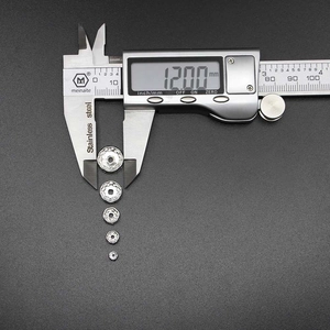 Silver stainless steel spacer beads in various sizes measured with digital caliper