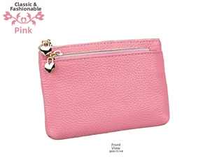 Detail of pink lychee leather coin purse with golden heart-shaped zippers on white background
