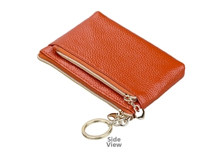 Side view of orange pebbled leather coin purse with double zippers and gold keychain