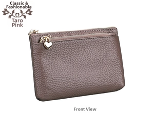 Detail of greyish-purple leather coin purse with heart-shaped zipper and litchi texture
