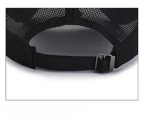 Detail of adjustable strap and metal buckle on breathable black mesh baseball cap